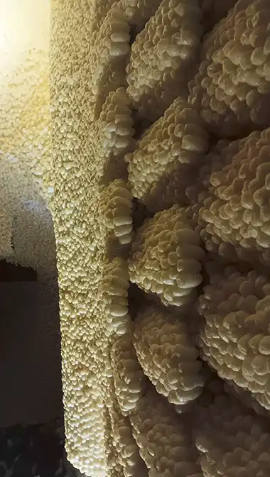 Handplaced sound dampening corn starch beads.